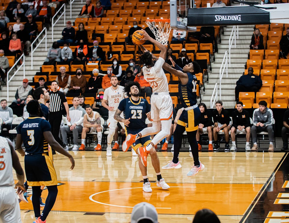 #20, Jalen Johnson, drives to the basket and scores on Chattanooga on Monday, Feb. 7. Johnson scored 10 points and had five rebounds in the game. 