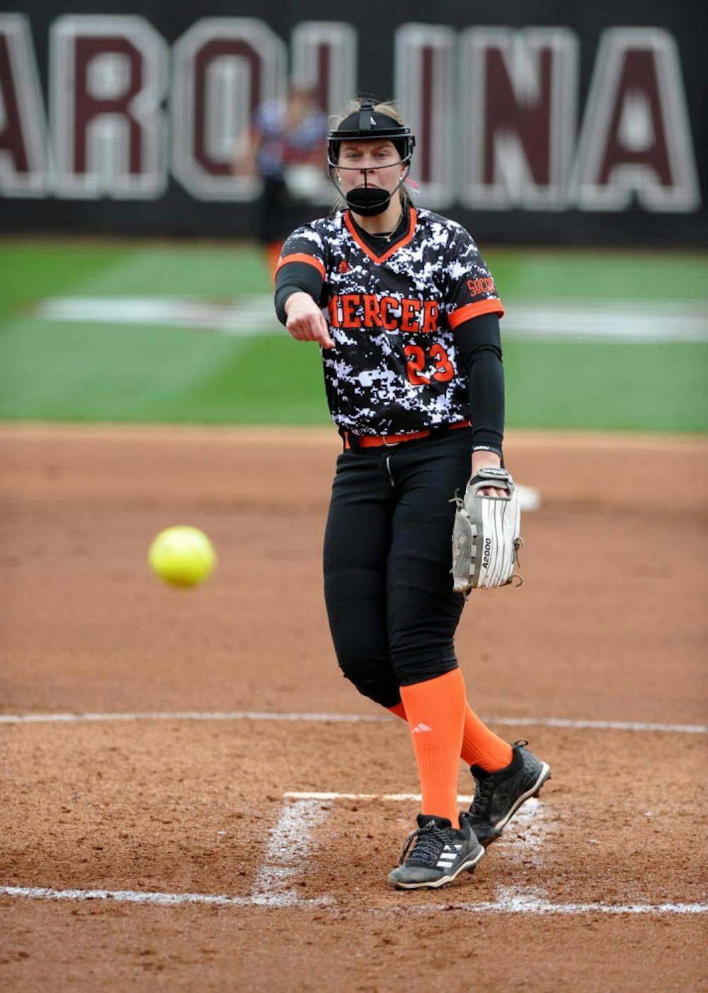 Pitcher Lauren O'Dell pitching at an away game.