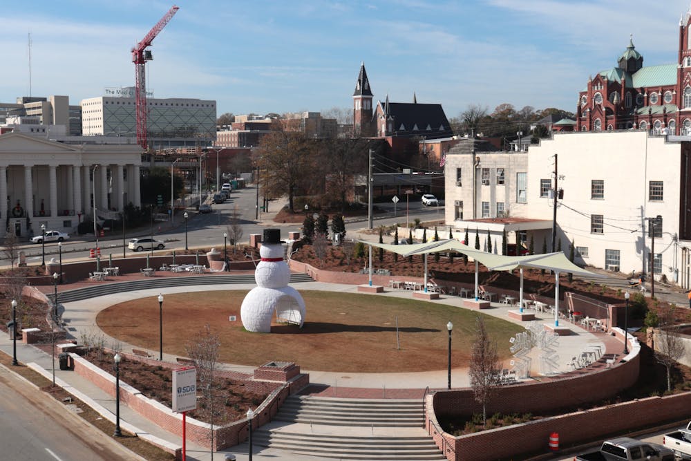 The newly remodeled Rosa Parks Square sits across from City Hall and held a 40-foot-tall snowman for Macon's annual Christmas light celebration along Poplar Street.