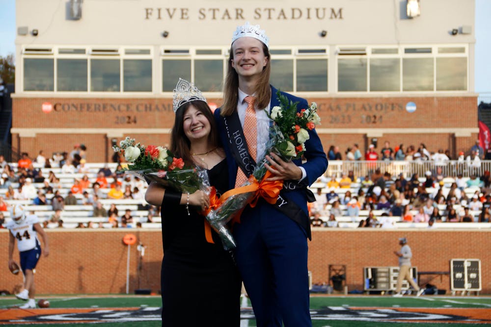 Homecoming queen Callie Lowery '26, left, stands with Homecoming king Nathan Weldon '26, right, after being crowned Saturday, Nov. 15, 2025.