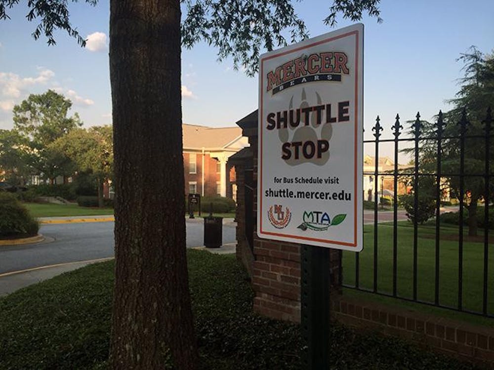 SGA's new shuttle stop sign sits outside of Greek Village. Students can view a bus schedule by visiting shuttle.mercer.edu.