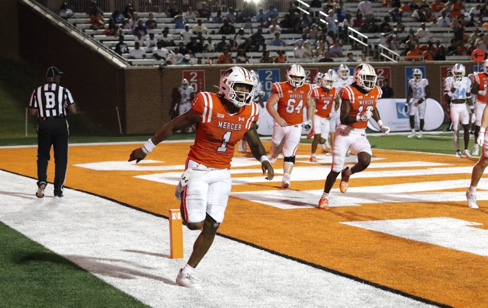 DJ Smith '26 celebrates his second touchdown run of the night against The Citadel. He accounted for four touchdowns - two rushing and two passing - against the Bulldogs as the Bears won, 38-21.