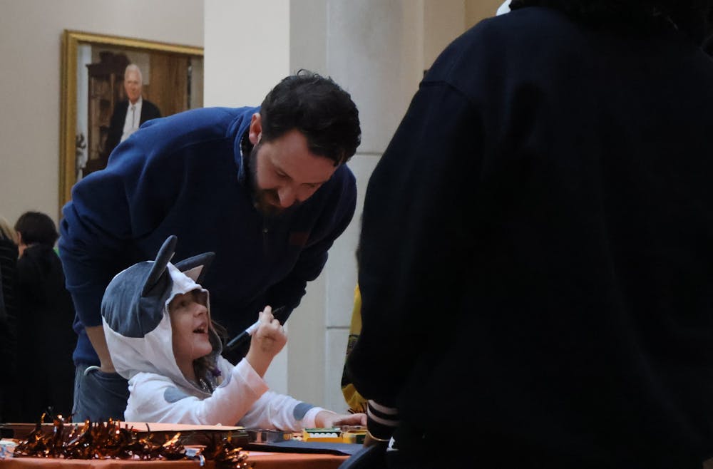 Coloring books and other activities awaited kids in Halloween apparel on Wednesday's Harvest Fest, put on by the Panhellenic Council and Campus Life.