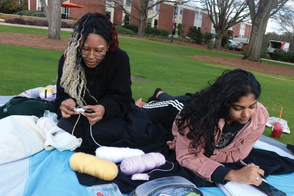 Sanaa Yusef and Nayahna Gordon hanging out on Cruz Plaza on Feb. 21.