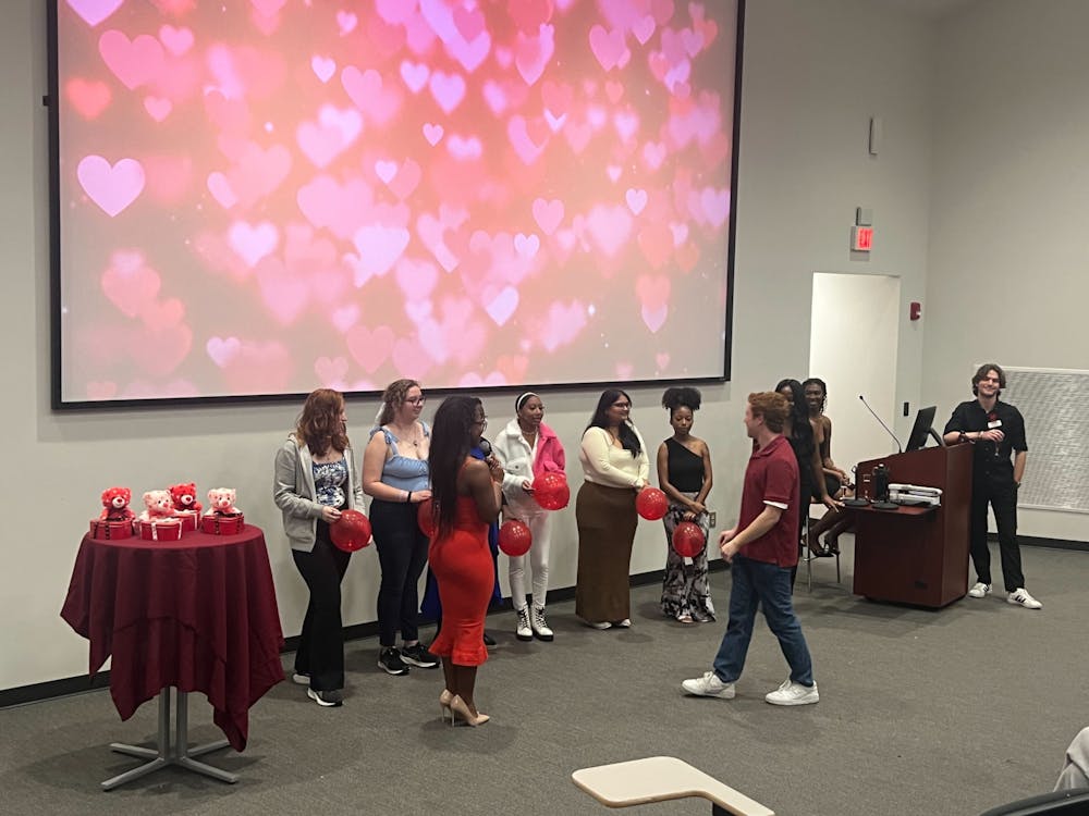 Contestants compete in Quadworks' "Pop the Balloon" event ahead of Valentine's Day on Feb. 1, 2025.