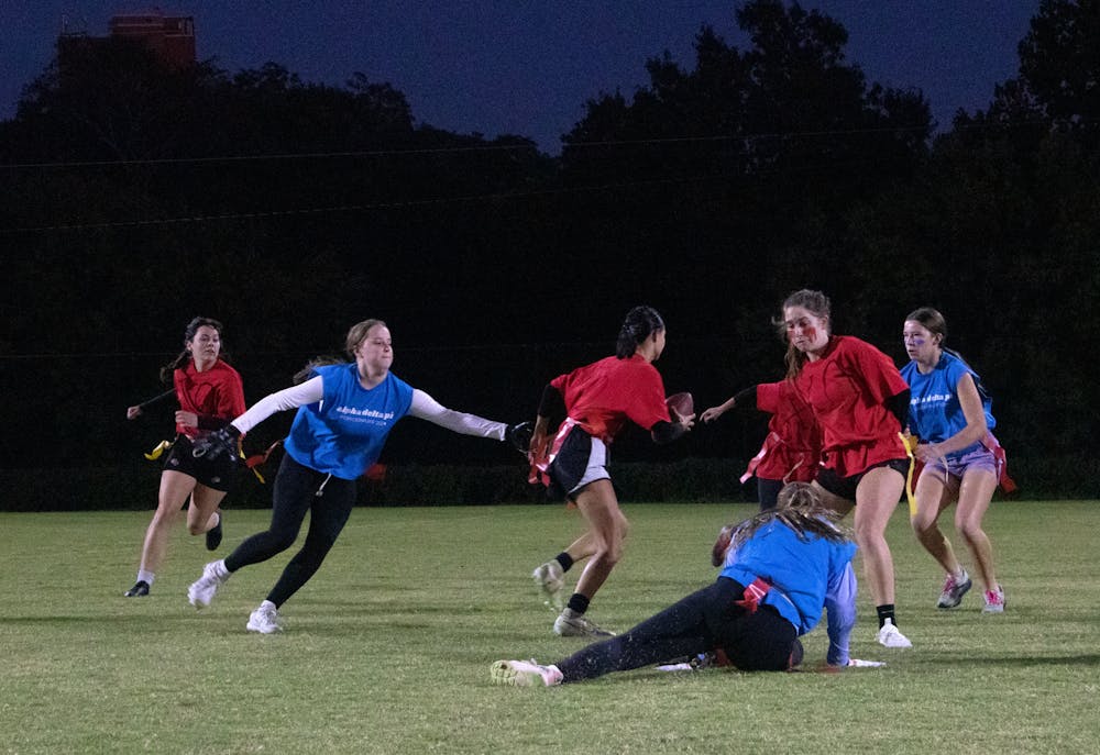 Members of Chi Omega and Alpha Delta Pi compete in the first game of ATO's powderpuff tournament.