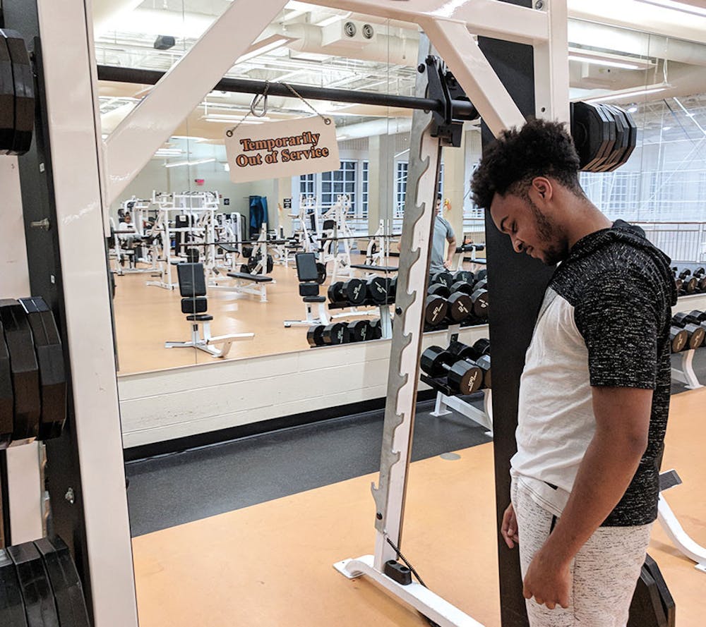 Kealon Edwards upset that the smith machine in the UC is, once again, out of service. 