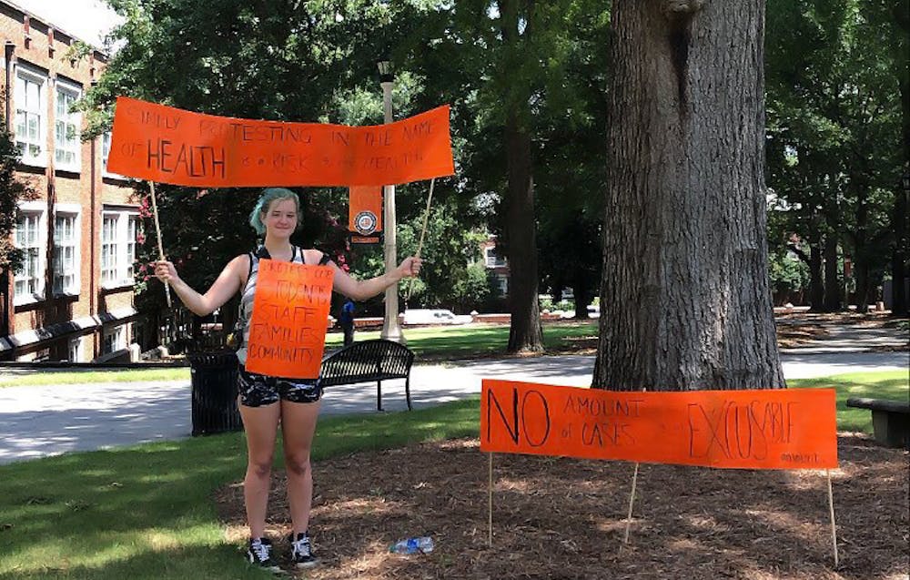 A Mercer student attends the protest for online classes at the Godsey Administration Building on July 14.
