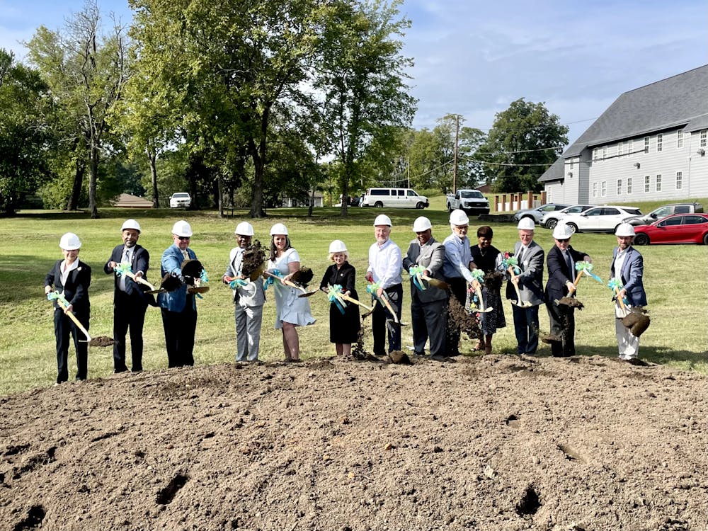 Staff and community members break ground to celebrate the beginning of construction for a new Crisis Stabilization Diagnostic Center on Sept. 21, 2023 in downtown Macon.