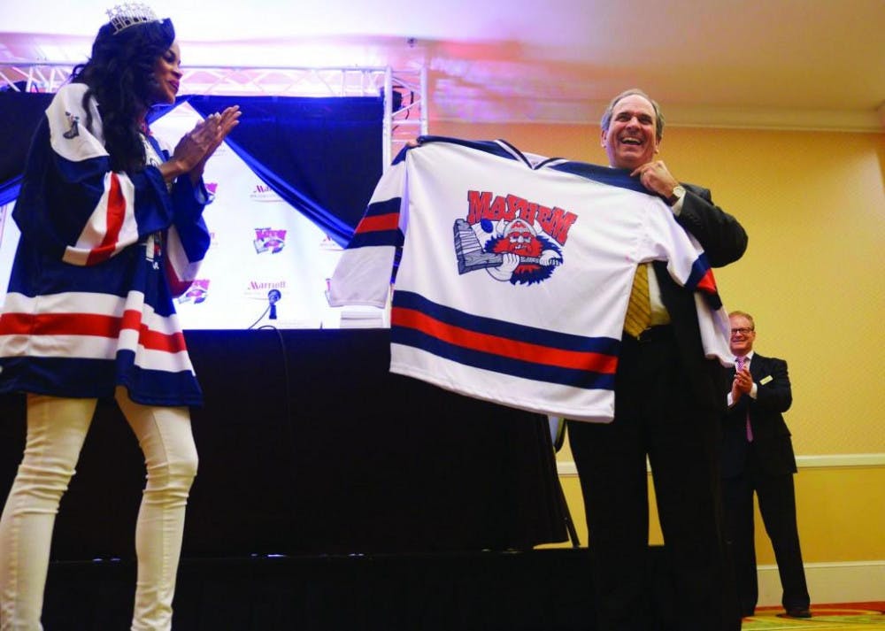 Macon-Bibb Mayor Robert Reichert shows off a Macon Mayhem jersey at the formal introduction of the new team Tuesday in Macon. The team comes from Augusta where they were the Riverhawks.