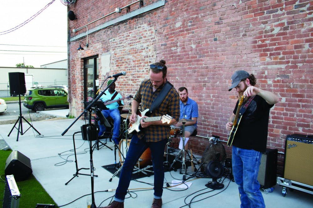 The Blane Dunnam Band sets up before their concert Sept. 11.
