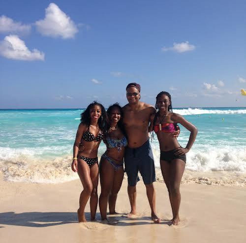 Angel Scandrick and her family in Cancun, Mexico over Christmas break one year.