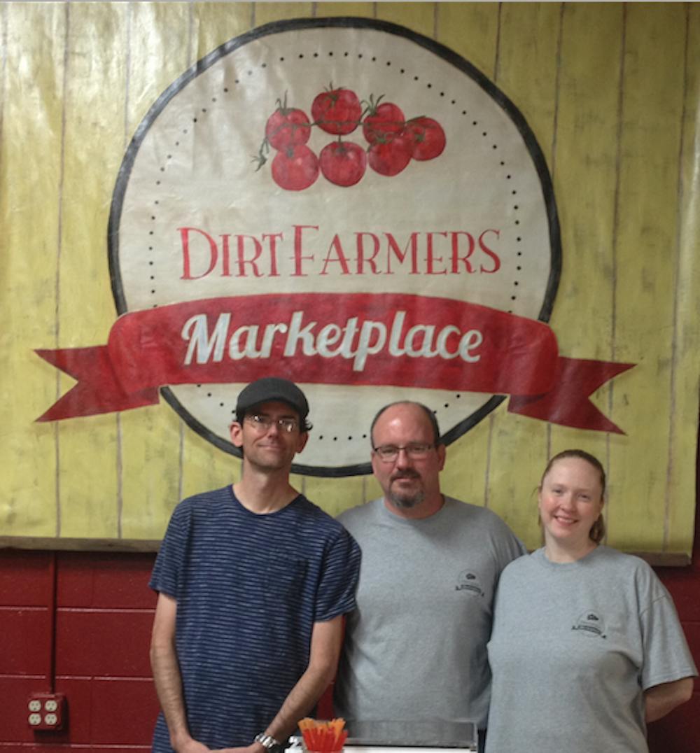 As part of the initiative Georgia Grown, the newly opened Dirt Farmer's Marketplace offers a fresh selection of local products. Pictured from left to right: Mike Lavender, Assistant Manager; Moriah Lavender, General Manager; Brendan Rowley, Owner-Operator. 