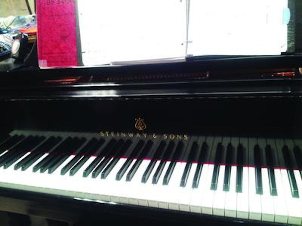 The Steinway piano ( a gift from the Godseys) in Professor Goff's room in the McKinnley Music Building.