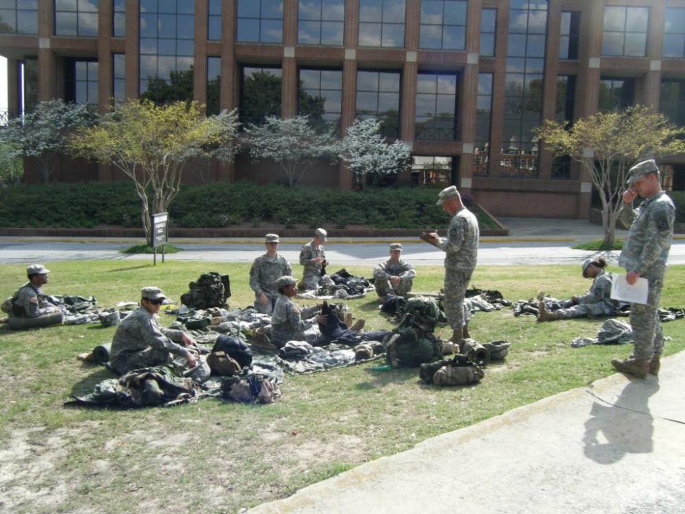 ROTC students meeting in front of Tarver Library. 