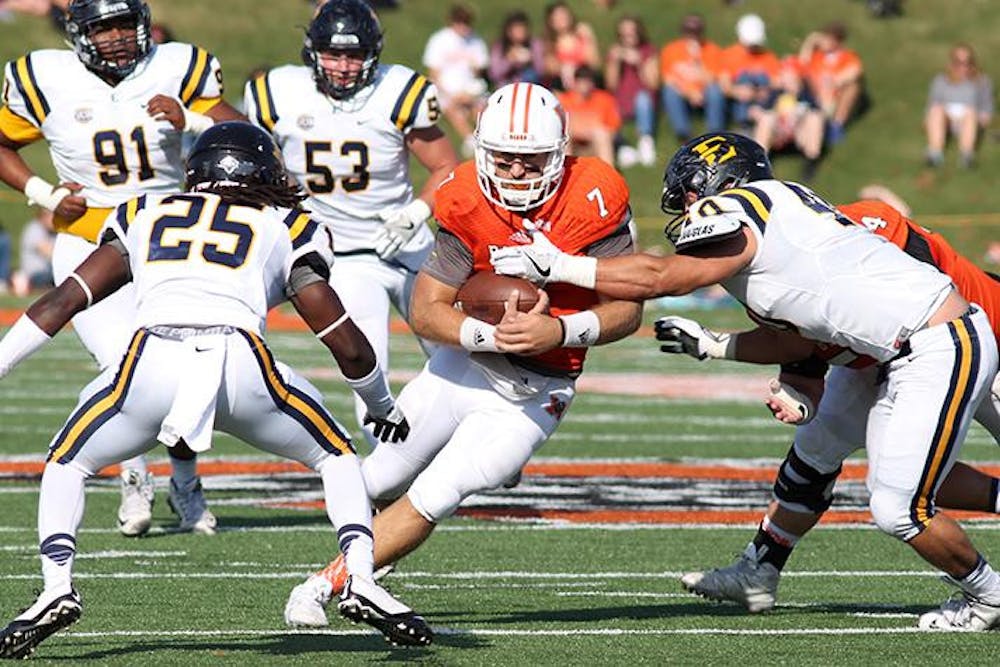 Mercer's John Russ (7) runs with the ball in Mercer's Homecoming game against East Tennessee State University on Saturday, November 5, 2016.