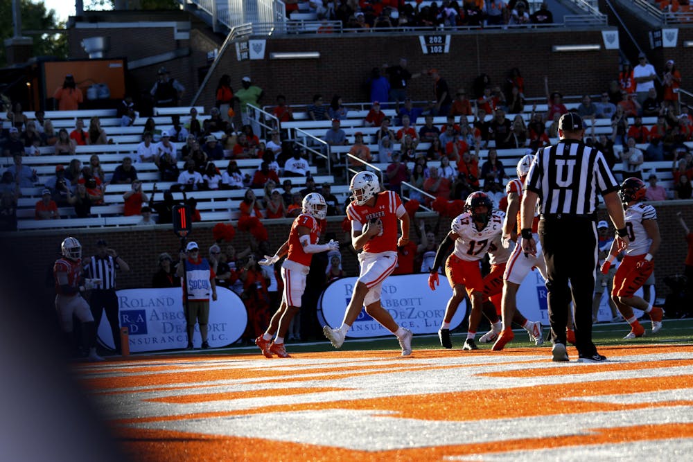 Whitt Newbauer '28 runs into the end zone against Princeton University on Saturday, Oct. 12, for his first career touchdown.