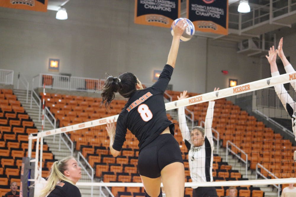 <p>Mercer middle hitter Rayanne De Oliveria (#8) spikes the ball over the net in Mercer&#x27;s game against The Citadel on Oct. 23. Photo provided by Mercer Athletics. </p>