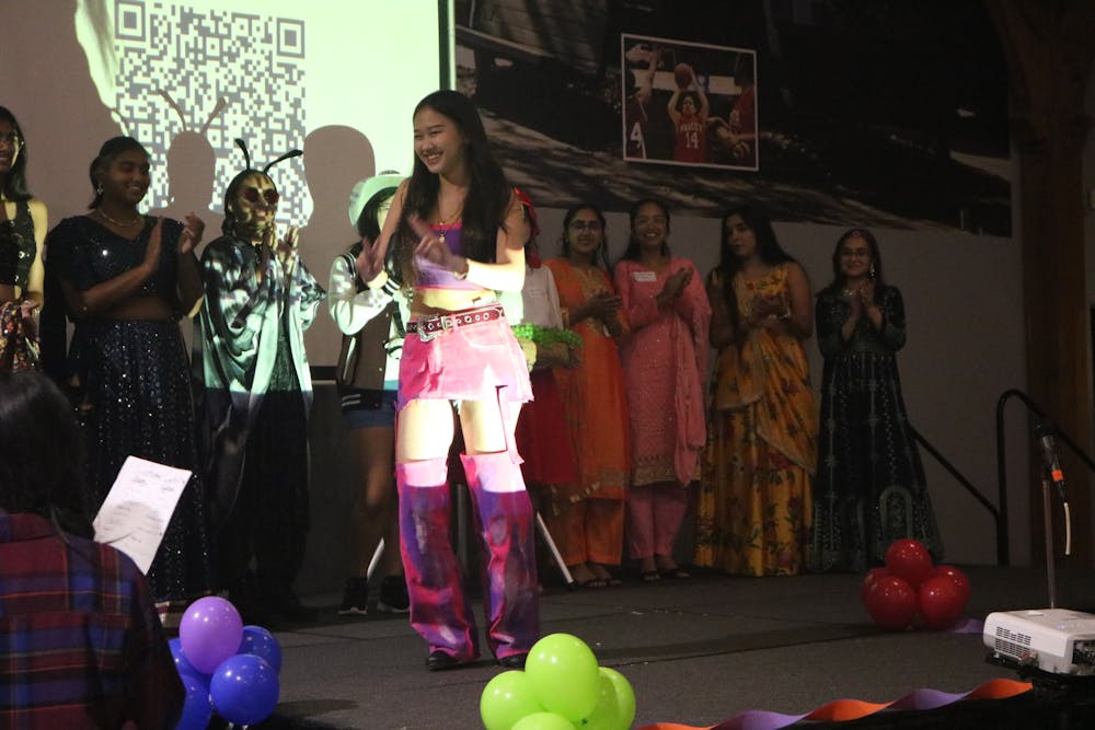 <p>Students participate in MASALA&#x27;s Multicultural Night Market costume contest.</p>