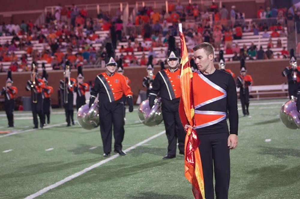 Thomas Patton in Mercer's second ever male color guard along with Josh Brown, who is also a current member of the team.