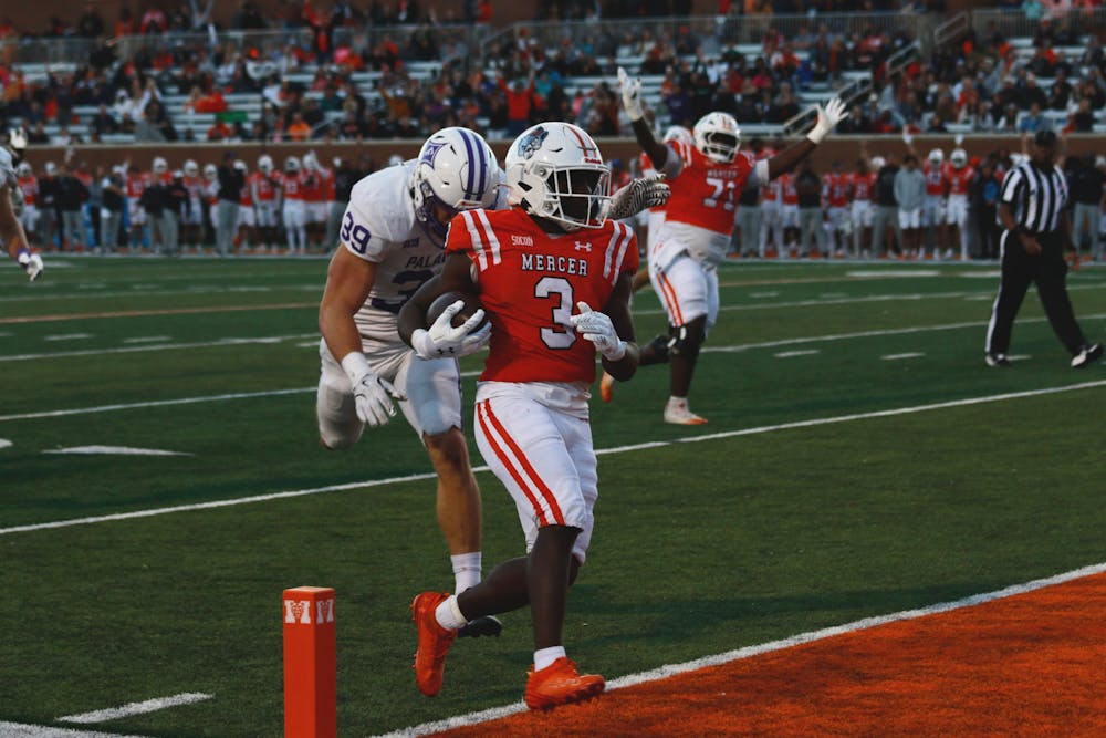 Dwayne McGee '25 leads the Bears in rushing yards and rushing touchdowns, including this one against Furman University on Nov. 23.