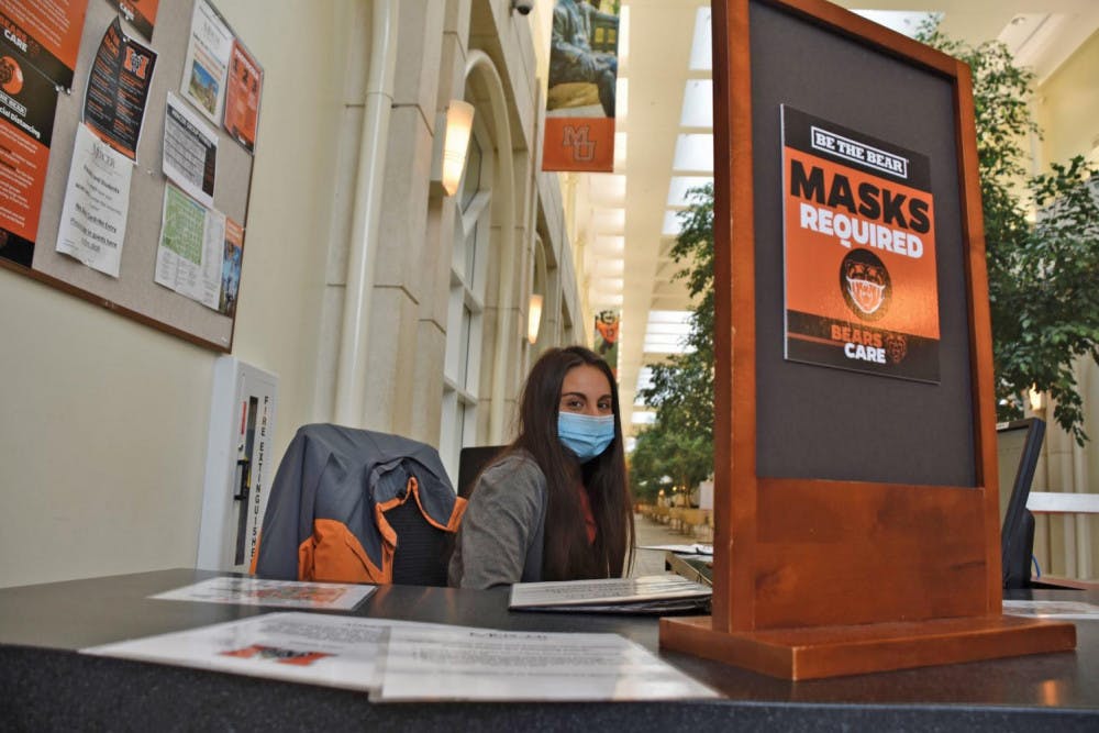 Lucia Gutierrez wears a mask in the University Center.