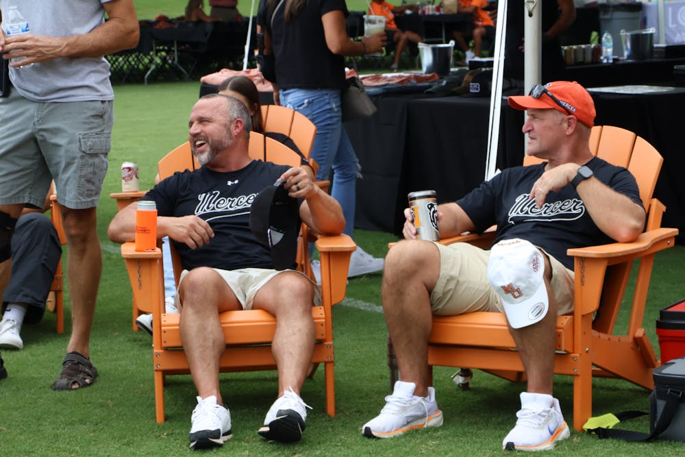 Fans gathered during Saturday's tailgate to watch the University of Texas take on defending national champion Ohio State University before heading into Five Star Stadium to watch Mercer take on Presbyterian College.