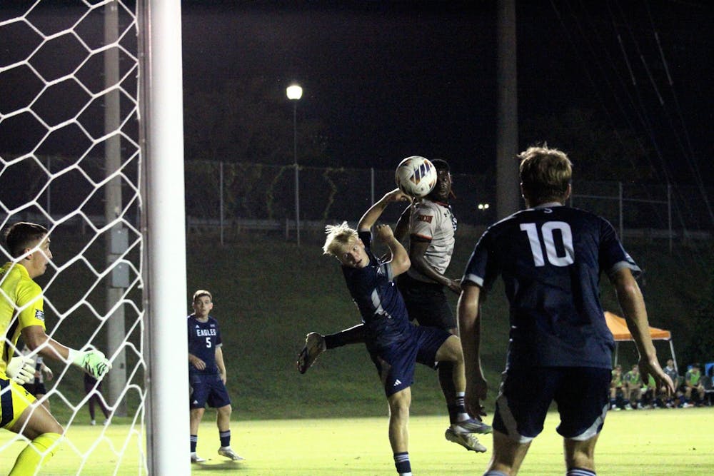 Forward Ehi Aimiuwu '27 goes up for a header against Georgia Southern University on Oct. 14.