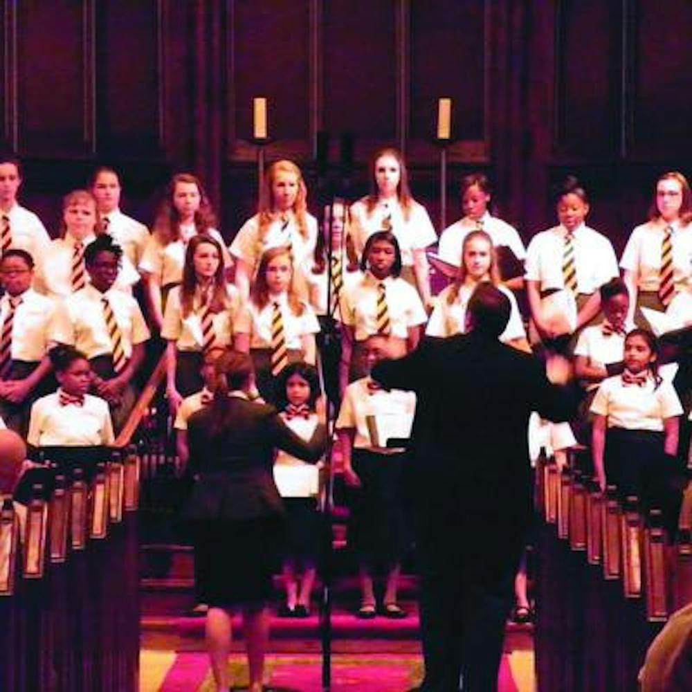 Courtesy of Mercer University Children's Choirs
Dr. Richard Kosowski leads the Mercer University Children's Choir in their annual "Sing &amp; Rejoice!" Christmas concert. 