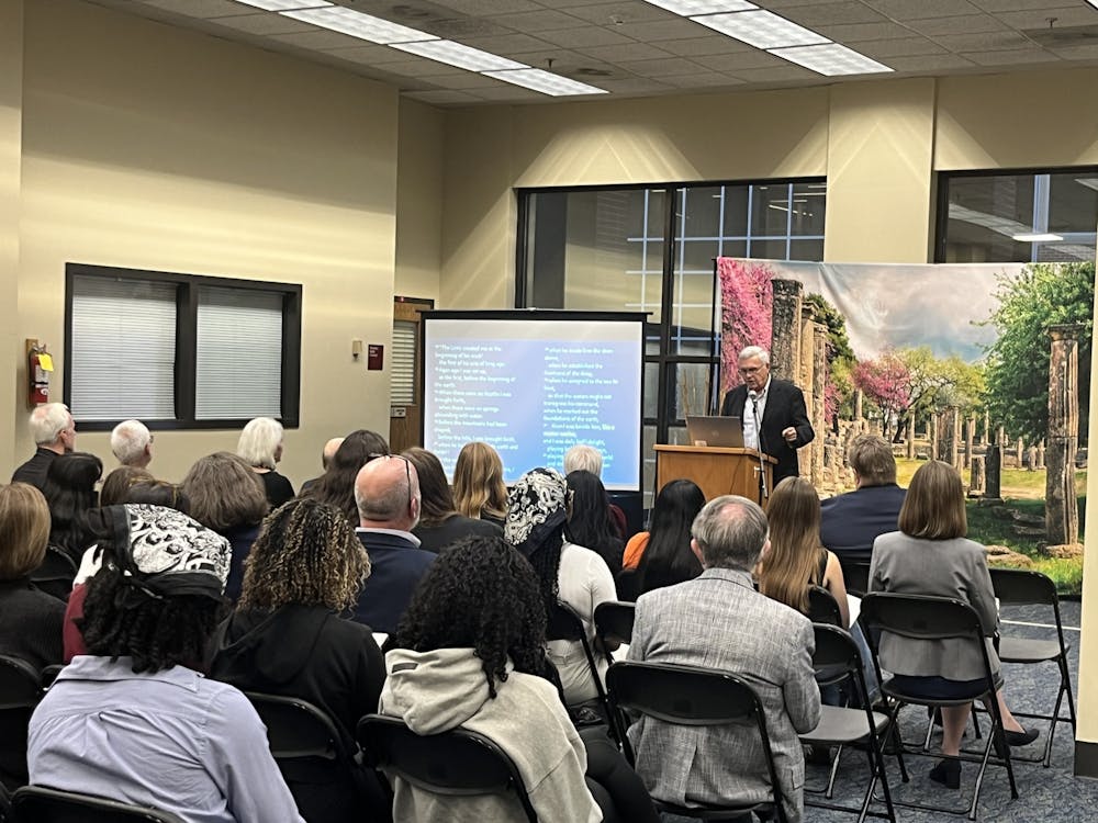 Scott Nash explored the connection between light and the Gospel of John in the New Testament during a lecture for the unveiling of the new "Let There be Light" exhibit in Tarver Library on Oct. 23, 2025.