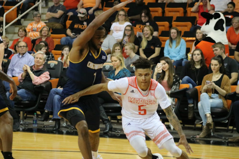 Jordan Strawberry (right) made three 3-point shots over a three-minute stretch to help the Bears pull away.