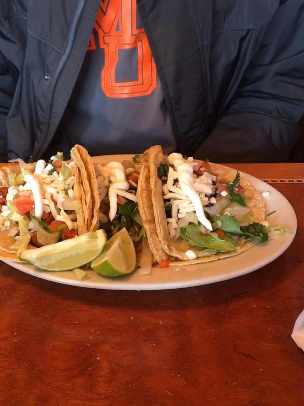 The tacos come with a variety of ingredients; pictured are tacos with cactus, chicken and beef.