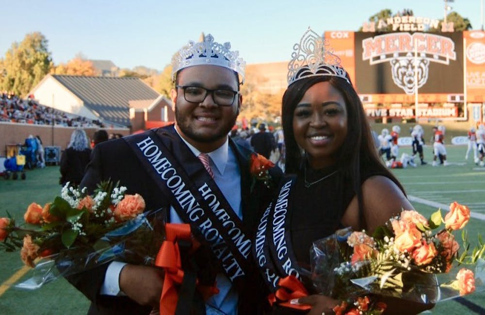 <p>Rylan Allen (left) and Sheridan King (right) pose for a photo after winning Mercer University Homecoming King and Queen 2021, both representing Mercer&#x27;s Student Government Association.</p>
