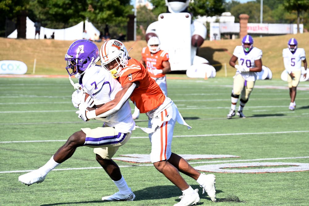 Michael Campbell (#9) takes down a Western Carolina player in the game on Saturday. Campbell had two tackles in the game and both were solo. The Bears defeated the Catamounts 49-6. 