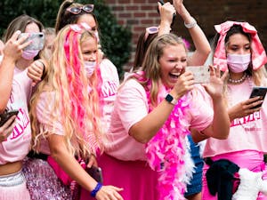 Members of Phi Mu take pictures of their new members during Panhellenic Bid Day on Sept. 6, 2021. Phi Mu’s national philanthropy is Children’s Miracle Network Hospitals. 