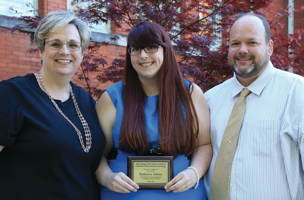 From left to right, Mrs. Kimberly Adams with her daughter Katherine and her husband Mr. Karl Adams. All three will be graduating from Mercer in May.