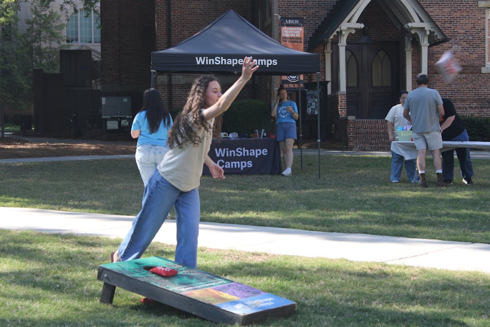 <p>BCM member Natalie Dix &#x27;27 played corn hole before the &quot;Good to Be Loved&quot; event that her organization hosted.</p>