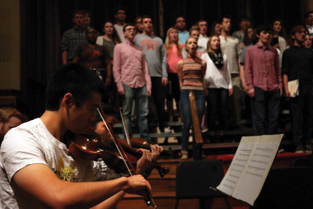 The Mercer McDuffie Center for Strings accompanies Mercer Singers.