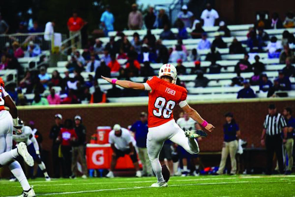 Cole Fisher (#98) breaks the all time scoring record in game against Western Carolina. Photo by Mitch Robinson.
