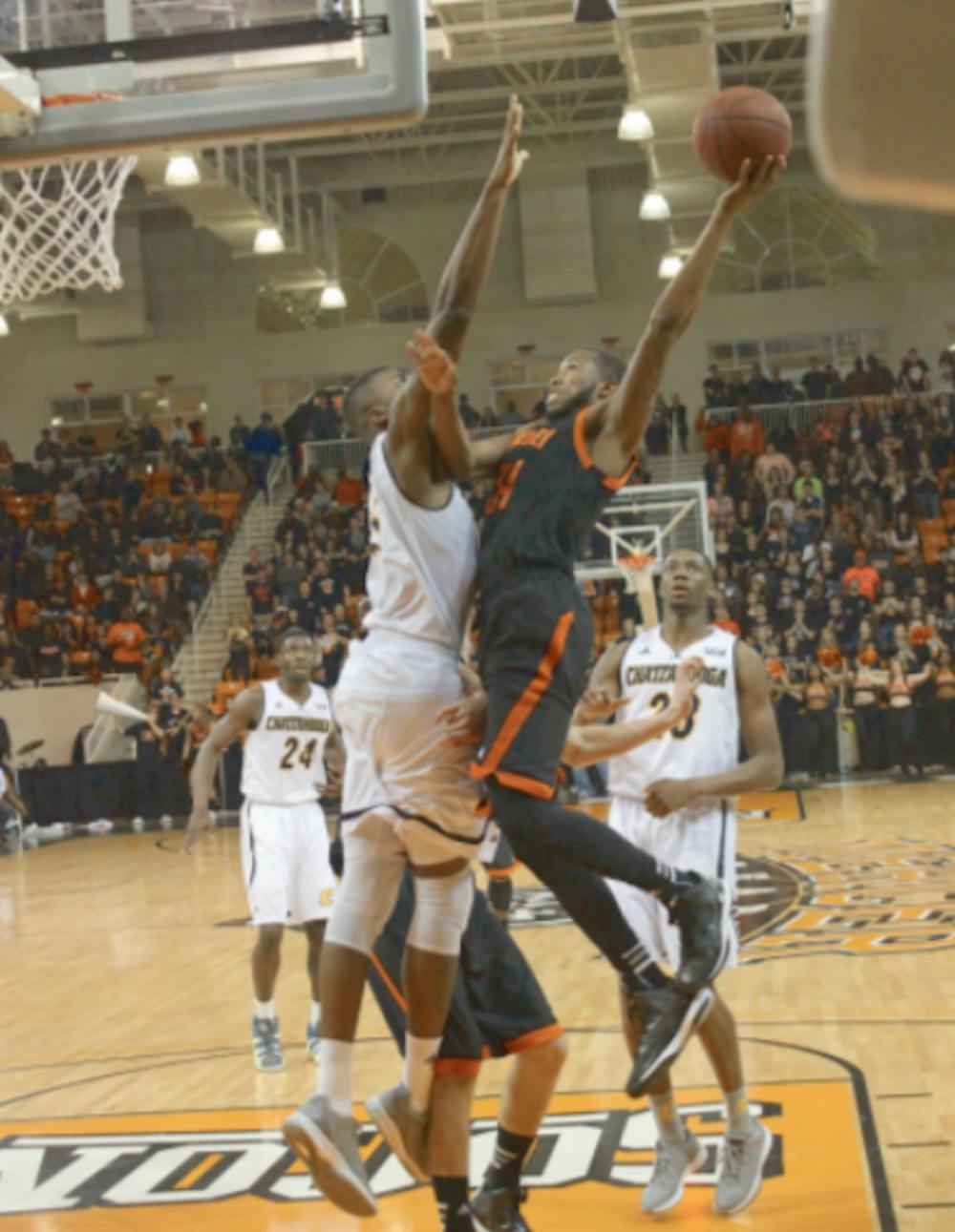 Jibri Bryan goes up against a defender in the Bears' game against the Chattanooga Mocs, February 2015.