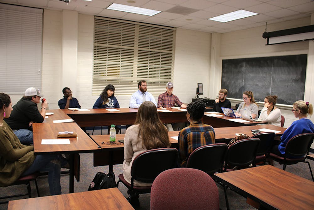 Mercer students discuss gun rights in Knight Hall for the Daring Dialogues program.