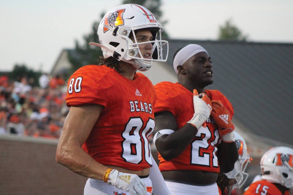 Wide Receiver Tucker Cannon watches Mercer face off against Austin Peay in between plays.