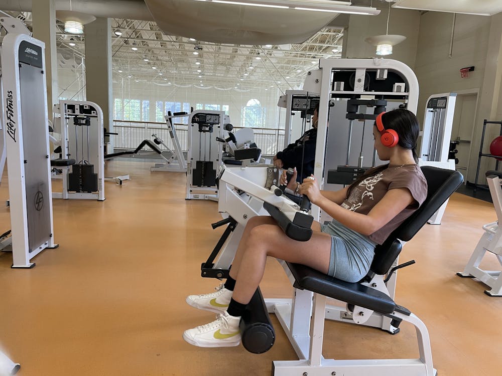 Yeidalis Garcia poses for a photo as she works out at the fitness center.