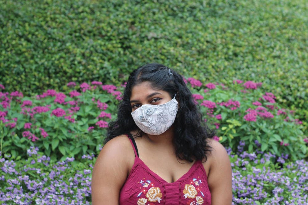 Junior Sanaa Yusuf wears a handmade mask.