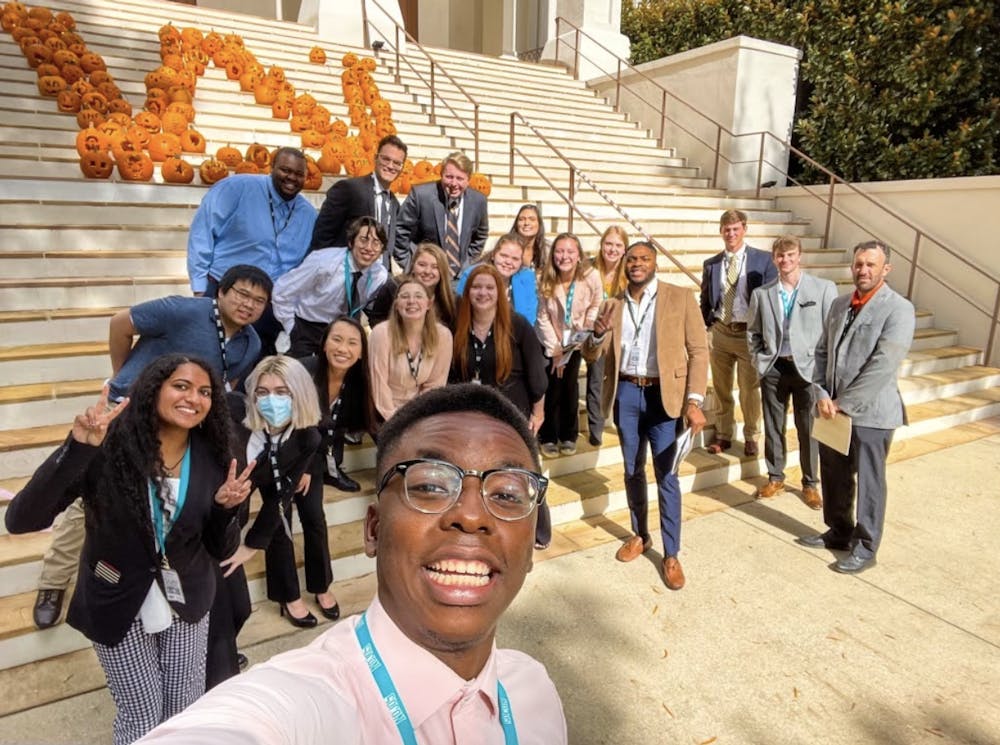 <p>Mercer students pose for a selfie at the Southern Conference Undergraduate Research Forum at Wofford College on Oct. 30. Photo provided by Themba Nsubuga.</p>