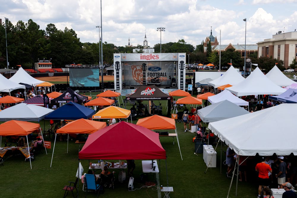 Mercer University celebrated Family Weekend with a tailgate for student organizations, businesses and families on Black Field. The tailgate events included live music from the Ford Concert Series, inflatables, giveaways and lunch, and it ended with the Bear Walk with the football team, Mercer cheerleaders and Toby the Bear.
