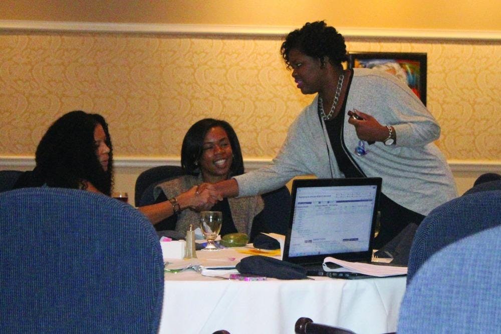 The attendees at the Bearly a Democracy symposium get interactive as they meet new people.