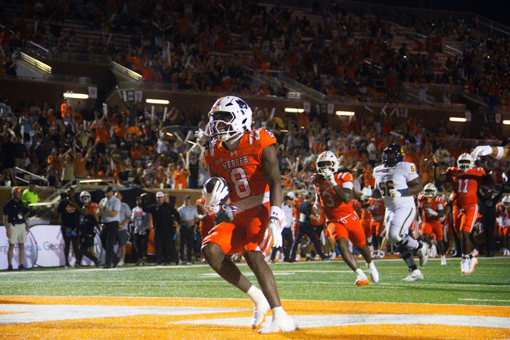 Cornerback Cameron Goggins '27 celebrates a pick-six against East Texas A&M on Aug. 30. 