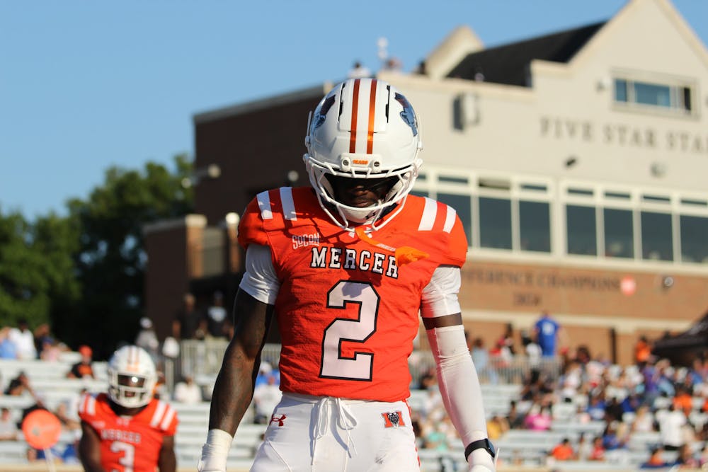 Adonis McDaniel '27 celebrates a touchdown at home against Presbyterian College on Aug. 30.