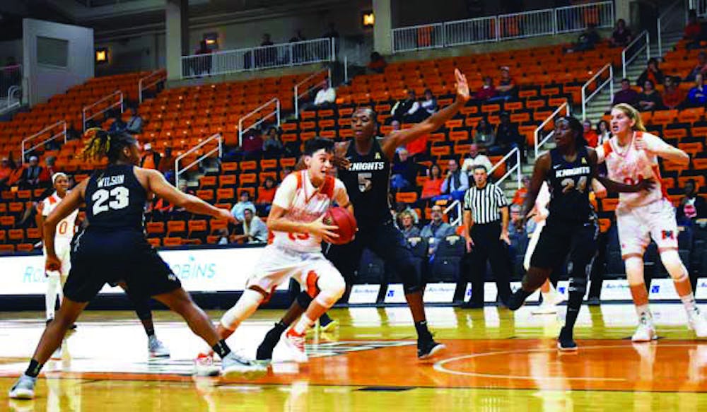Bears forward Ally Welch drives to the basket against the Central Florida defense. 